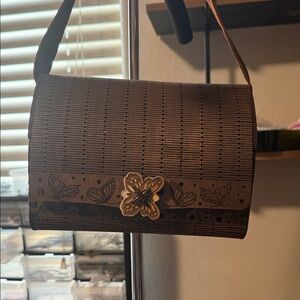 Chic Brown Woven Clutch with Butterfly Clasp